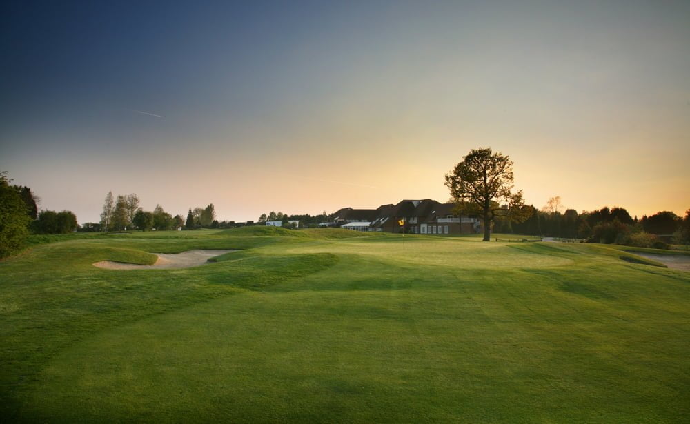 18. flötin á Woosnam vellinum. Flott par-5 braut sem rekur endahnútin á krefjandi og skemmtilegan golfvöll.