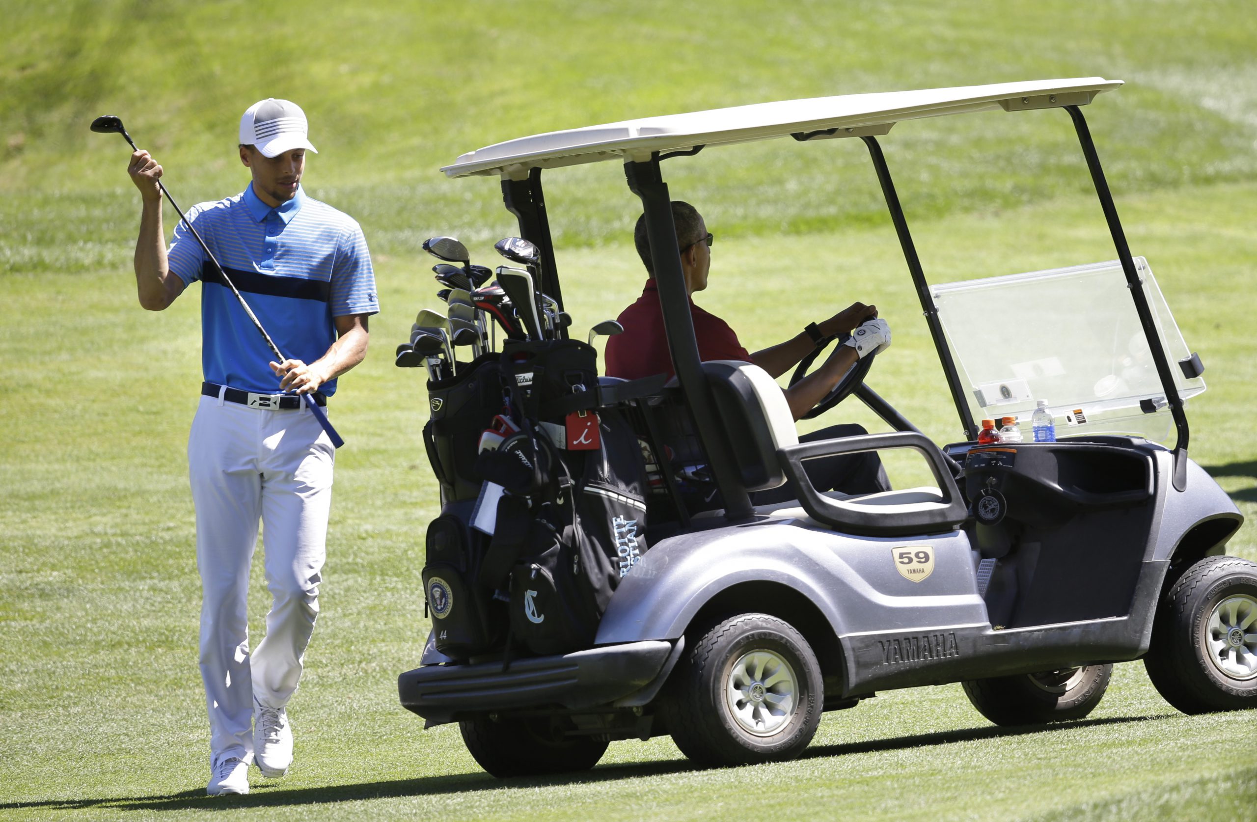 Stephen Curry með Barack Obama Bandaríkjaforseta í golfi.